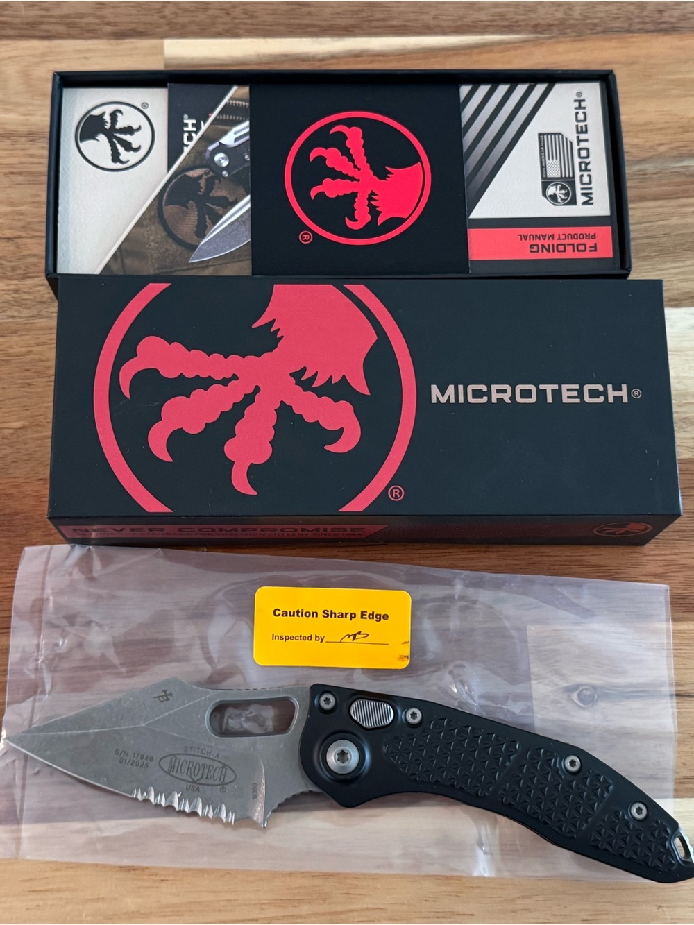 BNIB Microtech Stitch partially serrated.